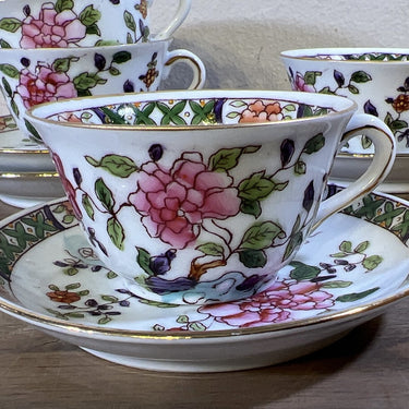 Tasse und Untertasse - kleine Größe (Kindergeschirr?) - Mosa/Louis Regout - Dekor aus rosa Blumen mit Lila, Orange und Blau