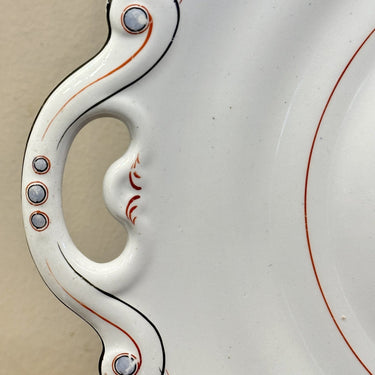 Bottom dish of a (soup) tureen - Petrus Regout - decor of a light blue rim with orange and black lines