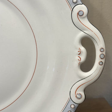 Bottom dish of a (soup) tureen - Petrus Regout - decor of a light blue rim with orange and black lines