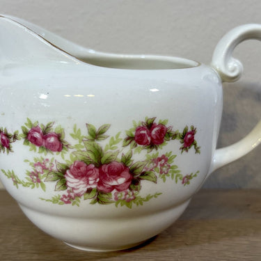Milk jug - Petrus Regout - decor BOUDEWIJN with double rose
