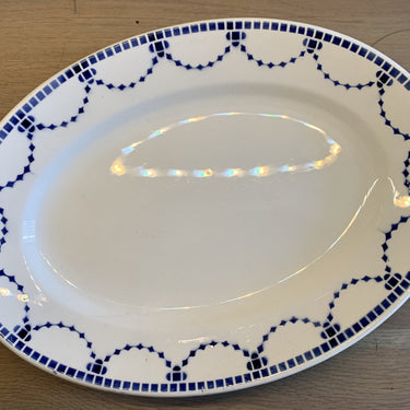 Bowl – oval – Saint Ghislain – blue rim decoration with geometric figures.