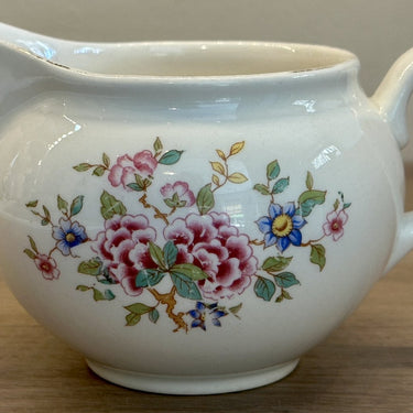 Milk jug - Petrus Regout - decor with pink/blue flowers in a spherical and larger model