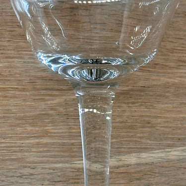 Glass on foot - smaller model - not marked - in clear glass with etched decoration