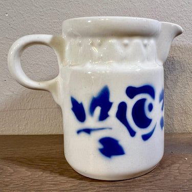 Milk jug - Torgau (GDR) - model HEIKE with a stylized rose in blue sprayed decoration