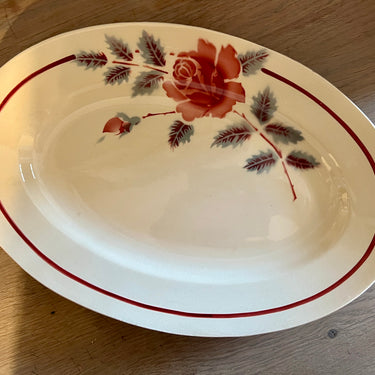 Bowl / Serving bowl - larger oval model - unmarked but Moulin des Loups - décor with pink rose in blue/grey branch on light brown cream-colored earthenware