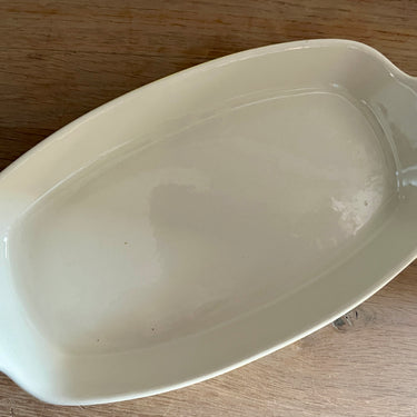 Ovenschaal - klein rechthoekig model - ongemerkt (waarschijnlijk Villeroy &amp; Boch?) - uitgevoerd in geel met crème gekleurde binnenzijde