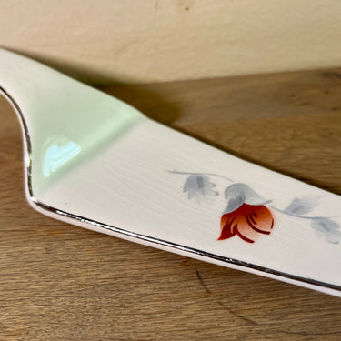 Taartschep - ongemerkt - décor met grijs/witte bladeren en een rood/paarse bloem