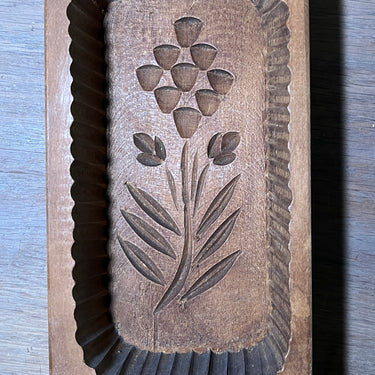 Botervorm - lager houten model - afbeelding van een bloem in de bodem