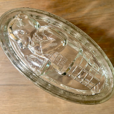 Puddingvorm - Leerdam Glasfabriek - afbeelding van Bruintje Beer/Rupert Bear in de bodem