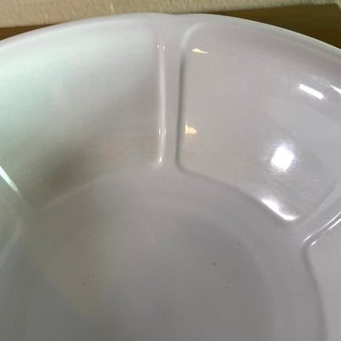 Salad bowl / Potato dish - larger model - Petrus Regout - executed in entirely white/cream earthenware with embossed accents on the inside