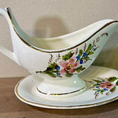 Juskom / Sauskom - Societe Ceramique Maestricht - decor met goudkleur randen en kleurige bloemen