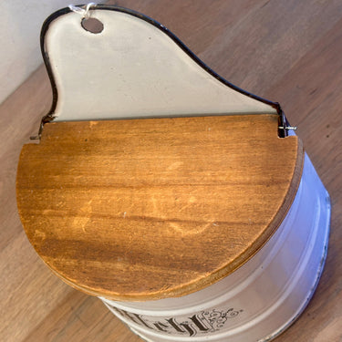 Storage jar - made of white enamel with a light wooden lid and the inscription MEHL (flour) in black letters
