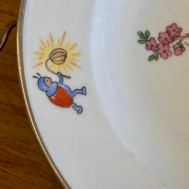 Warmwaterbord voor kinderen - afbeelding met kabouter en beestjes - gevat in roestvrij staal/metaal omhulsel - met handgrepen en sluitdopje