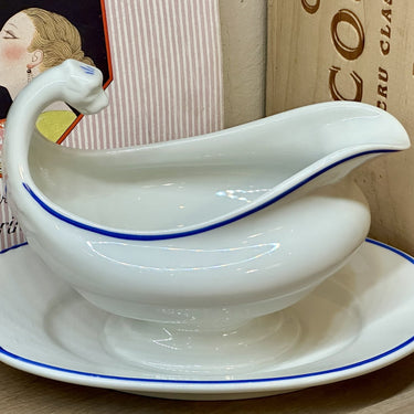 Gravy boat / Sauce boat - fixed base - Petrus Regout - white porcelain model with dragon head and blue fillets and relief