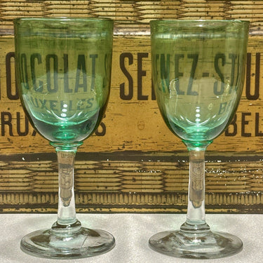 Liqueur glass (Martini glass?) - clear glass stem with green bowl