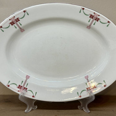 Bowl / Plate - flat, oval, larger model - Petrus Regout - decor 878 in red, pink and green with red/brown filet edge