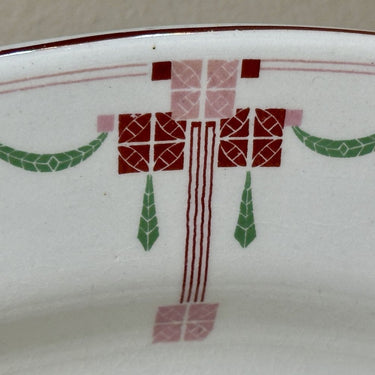 Bowl / Plate - flat, oval, larger model - Petrus Regout - decor 878 in red, pink and green with red/brown filet edge
