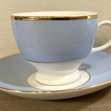 Cup and saucer - Doulton 2004 - in light blue with white and gold-coloured piping