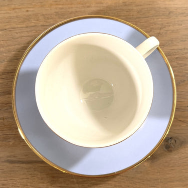 Cup and saucer - Doulton 2004 - in light blue with white and gold-coloured piping
