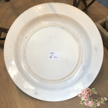 Diep bord – maker en decor onbekend – met diepblauwe bloemenrand en visser met netje.