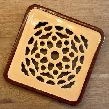 Coaster - light brown enamel with dark brown border