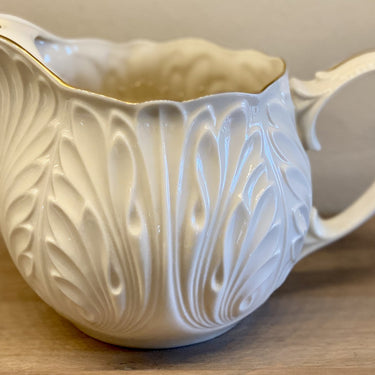 Pitcher with spout to hold ice cubes - Lenox USA - cream porcelain with gold accents
