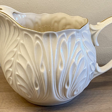 Pitcher with spout to hold ice cubes - Lenox USA - cream porcelain with gold accents