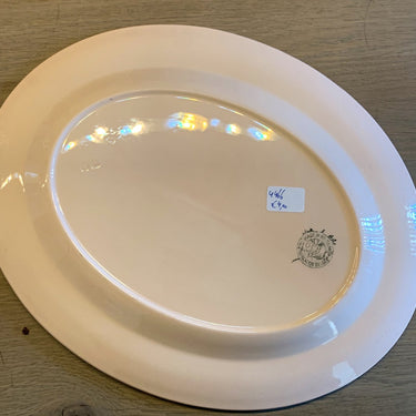 Teller - groß oval - Boch - rosa mit schwarz/rotem Streifendekor am Rand