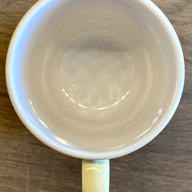 Mok / Beker - ongemerkt - pastelgeel met opschrift OXO in rood