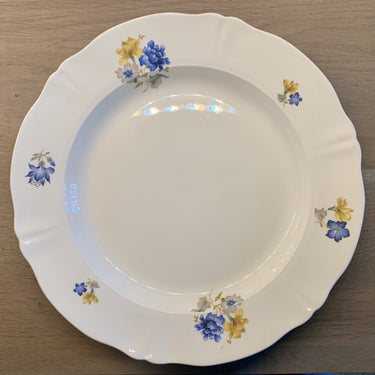 Bowl - round with wavy edge - Petrus Regout - dated ca. 1966/67 - decoration of blue and yellow flowers