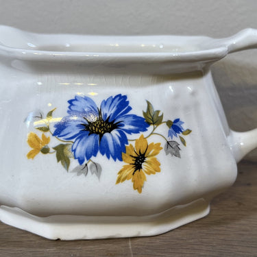 Melkkan - rechthoekig model - Societe Ceramique Maestricht - décor met blauw/gele (koren)bloemen