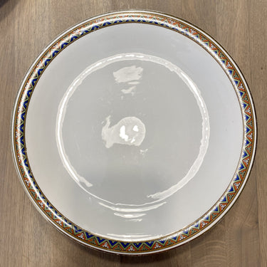 Schale auf niedrigem (geschlossenem) Fuß - Nimy - dekorativer Rand aus grün/blauem Zickzack mit orangefarbenen und weißen stilisierten Blumen